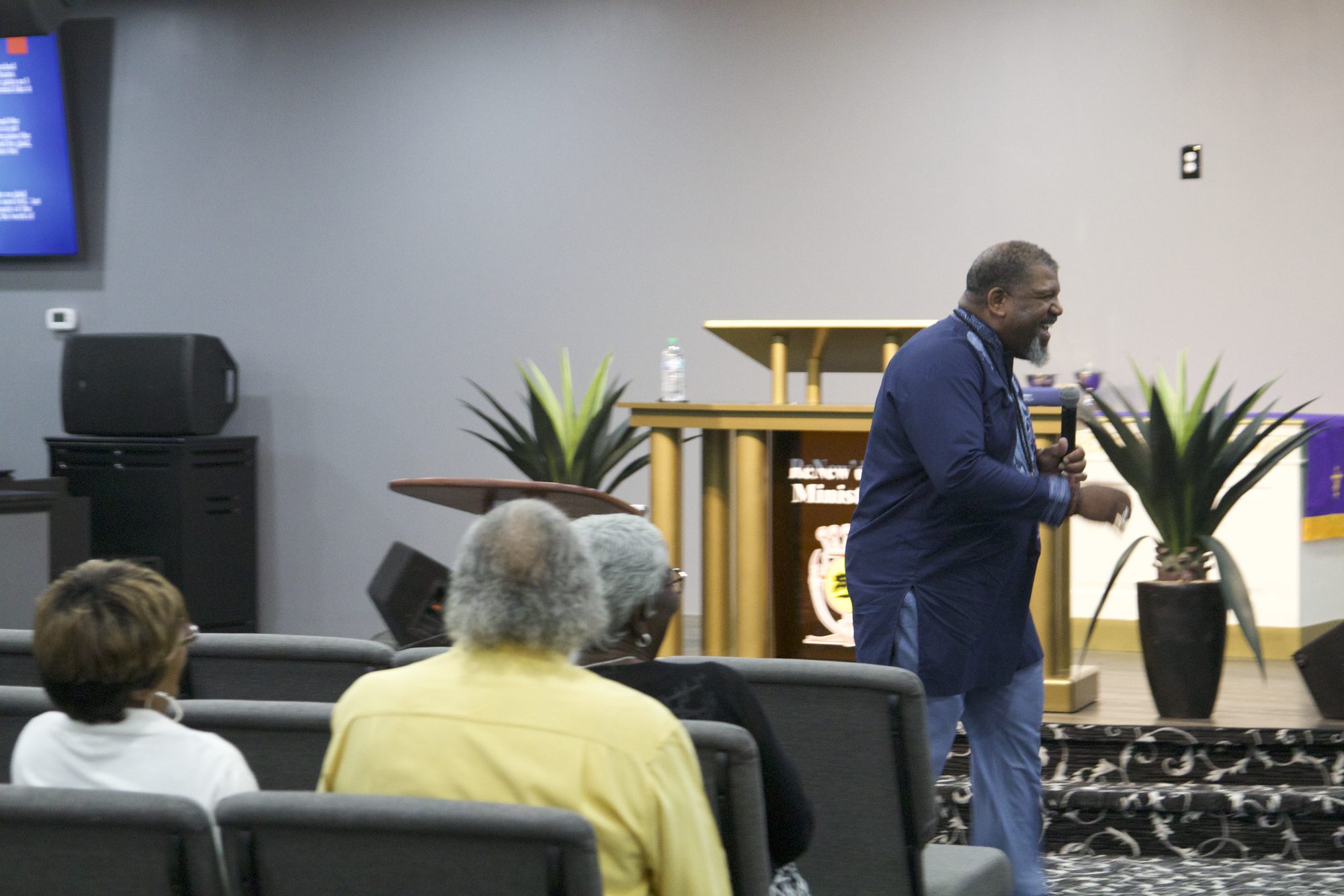 Pastor smiling during service